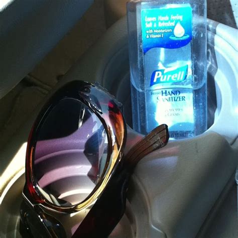 cleaning glasses with hand sanitizer.